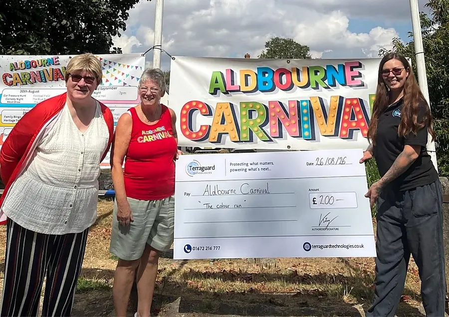 Terraguard staff presenting a &pound;200 sponsorship cheque to Aldbourne Carnival organisers